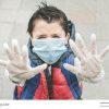 Coronavirus,Trauriges Kind Mit Medizinischer Maske - Ein Lizenzfreies über Bilder Kinder Mit Maske