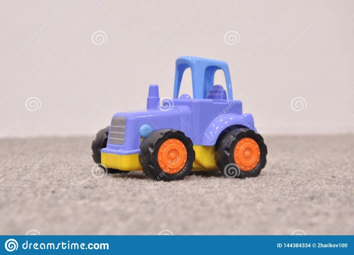 Das Spielzeug Der Kinder, Blauer Traktor Stockfoto - Bild Von Spielzeug verwandt mit Kinder Bild Traktor Das Spielzeug Der Kinder, Blauer Traktor Stockfoto - Bild Von Spielzeug verwandt mit Kinder Bild Traktor