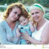 Zwei Frauen, Ein Baby, Lächeln, Glück, Familienporträt Stockfoto - Bild bestimmt für Nenas Kinder Bilder